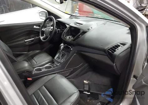 2016 Ford Escape Titanium z USA, uszkodzony, nr VIN 1FMCU9J97GUC36498